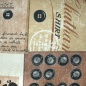 Preview: dekostoff in verschiedenen brauntoenen gemustert mit patches aus verschiedenen vintagemotiven