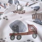 Preview: Weicher French Terry in hellem taupe mit Baustellen Fahrzeugen gemustert