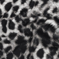 Preview: Weich fallender Viskosestoff in Schwarz Weiß mit Leoprint gemustert