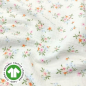 Preview: Weicher luftiger Bio Musselin in offwhite mit zarten Wiesenblümchen gemustert