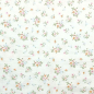 Preview: Weicher luftiger Bio Musselin in offwhite mit zarten Wiesenblümchen gemustert