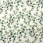 Preview: Weicher luftiger Bio Musselin in offwhite mit Eukalyptuszweigen und Blättern gemustert