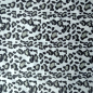 Preview: Kuschelweicher Wellnessfleece in grau mit Leopardenmuster