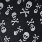 Preview: Kuscheliger Wellnessfleece in schwarz mit Totenköpfen gemustert