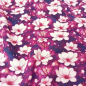 Preview: Superkuscheliger warmer Alpenfleece in pink und violetten Farbtönen mit Blumen gemustert