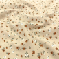 Preview: Weicher Baumwolljersey in Sand mit Miniblumen  gemustert