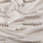 Preview: Weicher Baumwolljersey in hellem Nougat mit Babywords gemustert