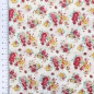 Preview: Baumwollstoff mit roten und Gelb Blumen gemustert.