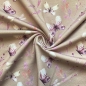 Preview: French Terry in beige mit schmetterlingen gemustert.