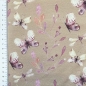 Preview: French Terry in beige mit schmetterlingen gemustert.