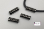 Preview: vier schwarze kordelenden aus metall mit 5 mm Durchmesser