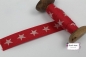 Preview: Rolle mit Gurtband in rot mit Sternen in ecrufarben. Breite 3,5cm - 4,0cm