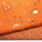Preview: Baumwolljersey von HILCO in rostfarben gemustert mit weißen Punkten im Digitaldruck aus der Stoffserie "organic safari".  mit passenden Kombistoff