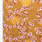 Preview: sehr weicher Baumwolljersey in senf mit Blümchen gemustert.
