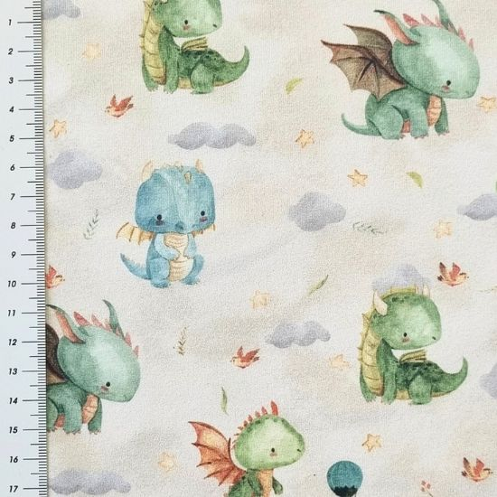 Preview: weicher French Terry mit suessen Babydrachen gemustert