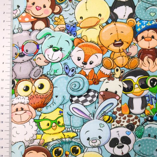 Preview: weicher French Terry mit lustigen Spielzeugtieren gemustert