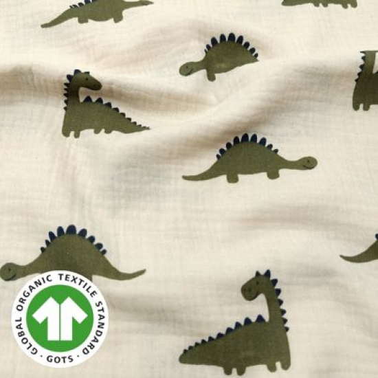 Weich fallender Bio Musselin in ecru mit süßen Dinos gemustert