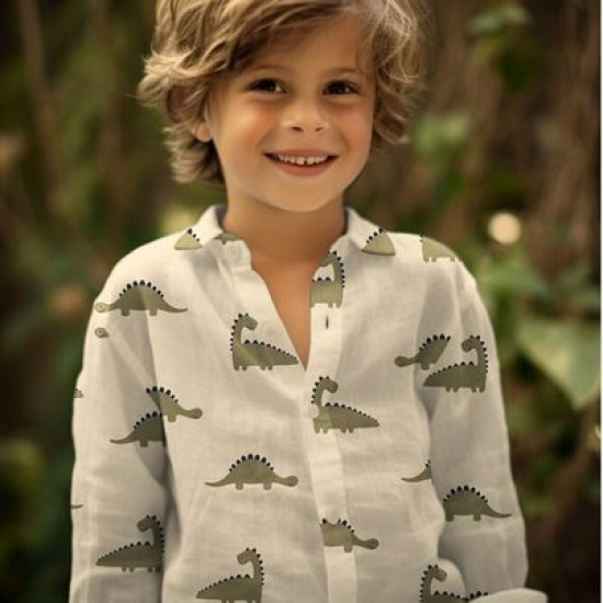 Preview: Weich fallender Bio Musselin in ecru mit süßen Dinos gemustert