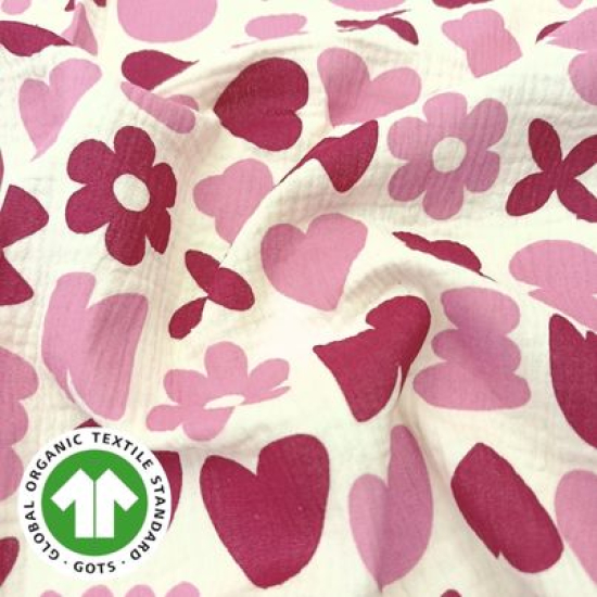 Weicher luftiger Bio Musselin in ecru mit rosa und rotem Blumenkonfetti gemustert