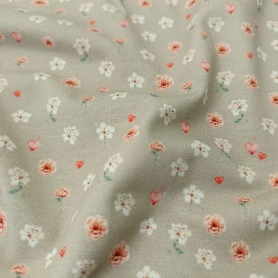 Kuschelweicher Jersey in taupe mit süßen Miniblüten und Herzchen gemustert