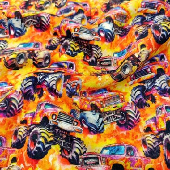 Kuschelweicher und warmer Sweatstoff in Orangetönen mit coolen Monstertrucks gemustert