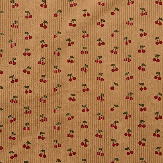 Weich fallender Baumwoll Stretch Cord in beige mit Minikirschen gemustert