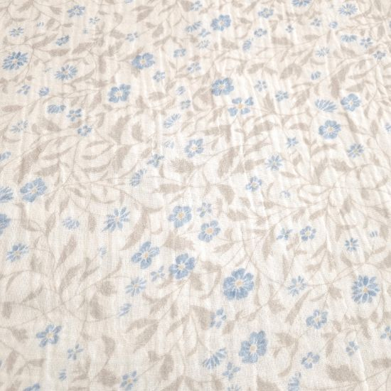 Preview: Weich fallender Musselin in offwhite mit romantischen Blumen gemustert