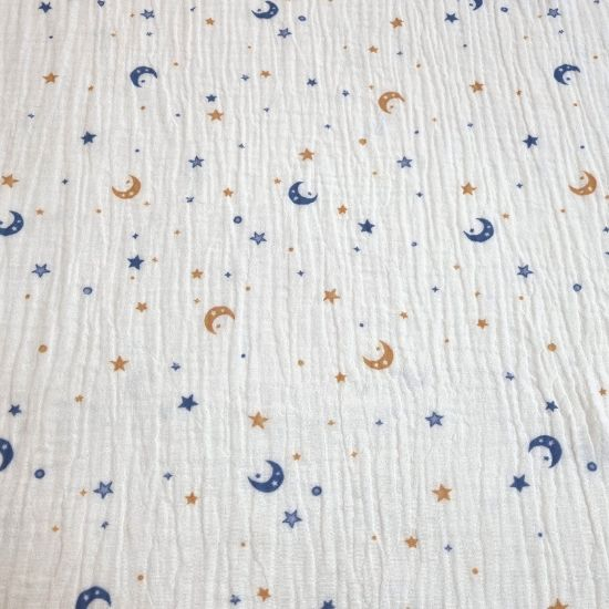 Weich fallender Musselin in offwhite mit Monden und Sternen gemustert