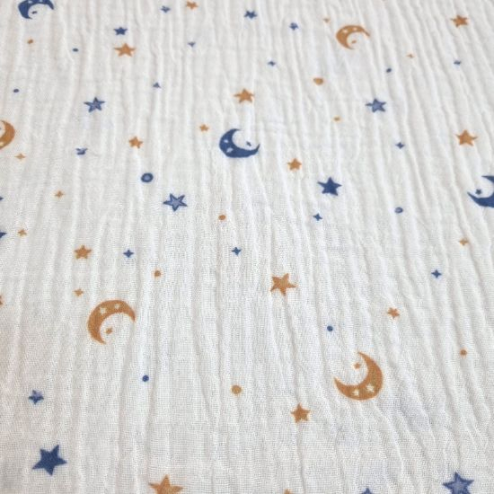 Weich fallender Musselin in offwhite mit Monden und Sternen gemustert