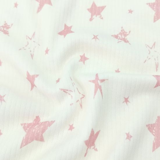 Kuschelweicher Ribjersey aus reiner Baumwolle mit Sternen in rosa gemustert.