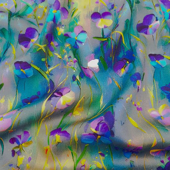 Weiche luftige Viskose in Petroltönen mit Veilchenblüten gemustert