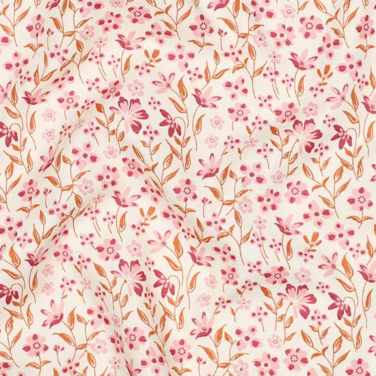 Leicht fallender Baumwollstoff in weiß mit Vintage Blümchen in rosa Farbtönen gemustert