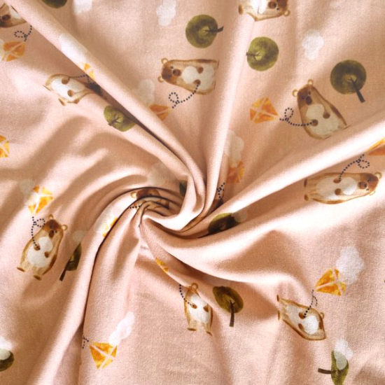 Preview: Baumwolljersey mit Kindermotiv in Lachsfarben.