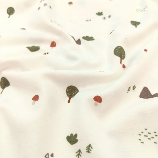 Weicher Baumwolljersey in Ecru mit Mini Waldmotiven gemustert