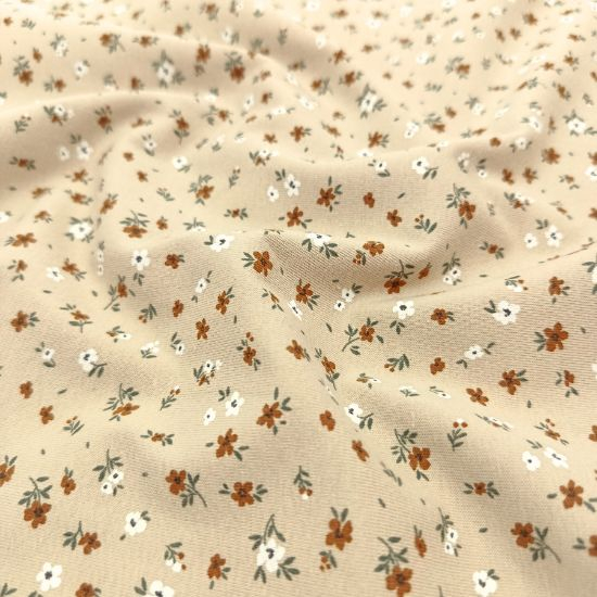 Weicher Baumwolljersey in Sand mit Miniblumen  gemustert
