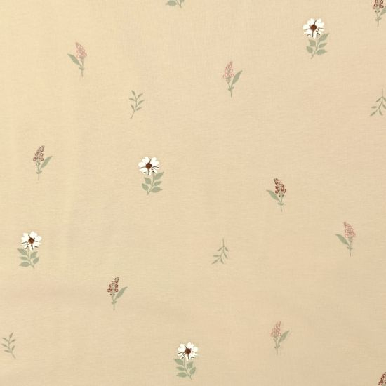 Weicher Baumwolljersey in Sand mit einzelnen Blümchen gemustert