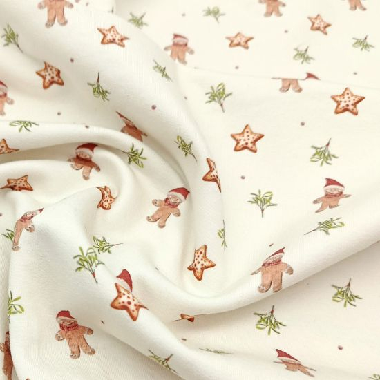 Weich fallender Baumwollstoff aus mit Lebkuchen Leckereien gemustert