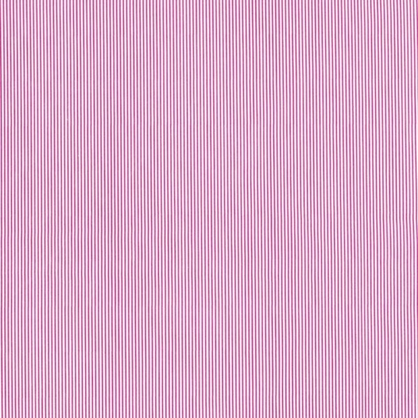 Baumwollstoff in pink mit verschiedenen Mustern.
