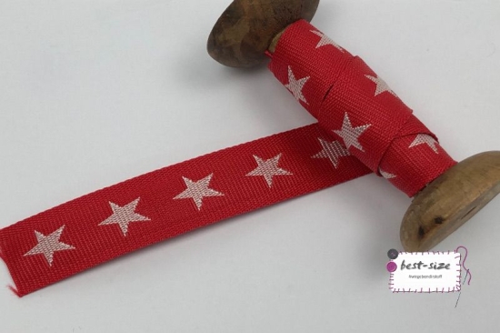 Rolle mit Gurtband in rot mit Sternen in ecrufarben. Breite 3,5cm - 4,0cm