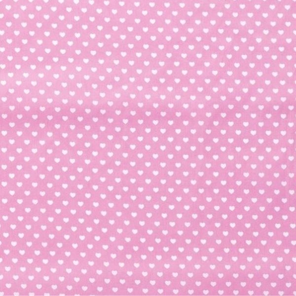Baumwollstoff in rosa mit verschiedenen Mustern.