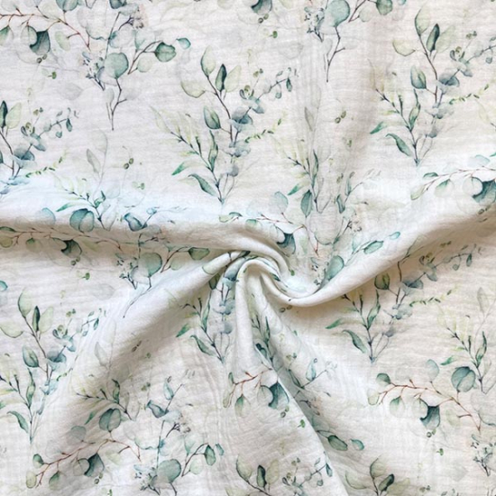 Preview: Musselin mit Eukalyptus gemustert.