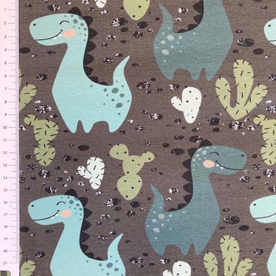 Preview: leicht angrauter French Terry in Olivgrün mit Dinos gemustert.