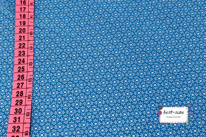 baumwollstoff der marke tante ema in tuerkisblau mit motiven von kleinen weißen blumenblueten mit massband links zur groesseneinordnung