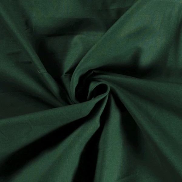 aumwollstoff in Tanne mit verschiedenen Mustern.