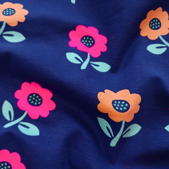 Kuschelweicher Jersey in royalblau mit Neonblumen gemustert
