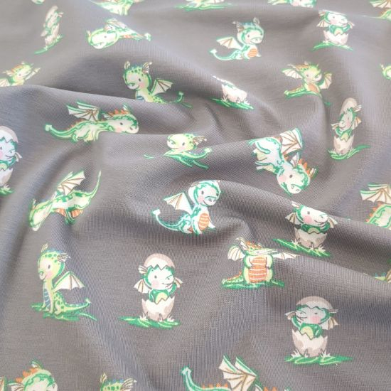 Kuschelweicher Jersey in Grau mit süßen Drachenbabys gemustert