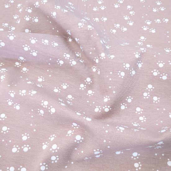 Kuschelweicher Jersey in Altrosa mit kleinen Pfotenabdrücken gemustert gemustert