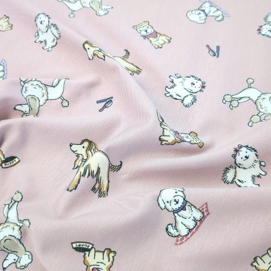 Kuschelweicher Jersey in Altrosa mit kleinen süßen Hunden gemustert