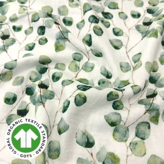 Weicher luftiger Bio Musselin in offwhite mit Eukalyptuszweigen und Blättern gemustert