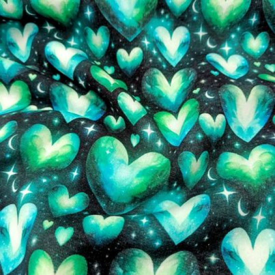 Kuschelweicher und warmer Sweatstoff in schwarz mit türkisfarbenen Herzen gemustert